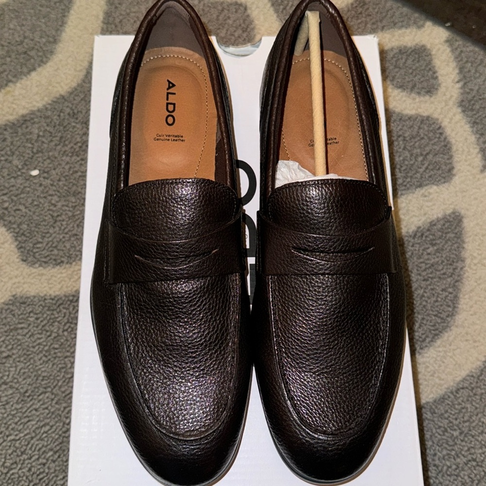 Brand new Aldo dark brown loafers in size 8us
